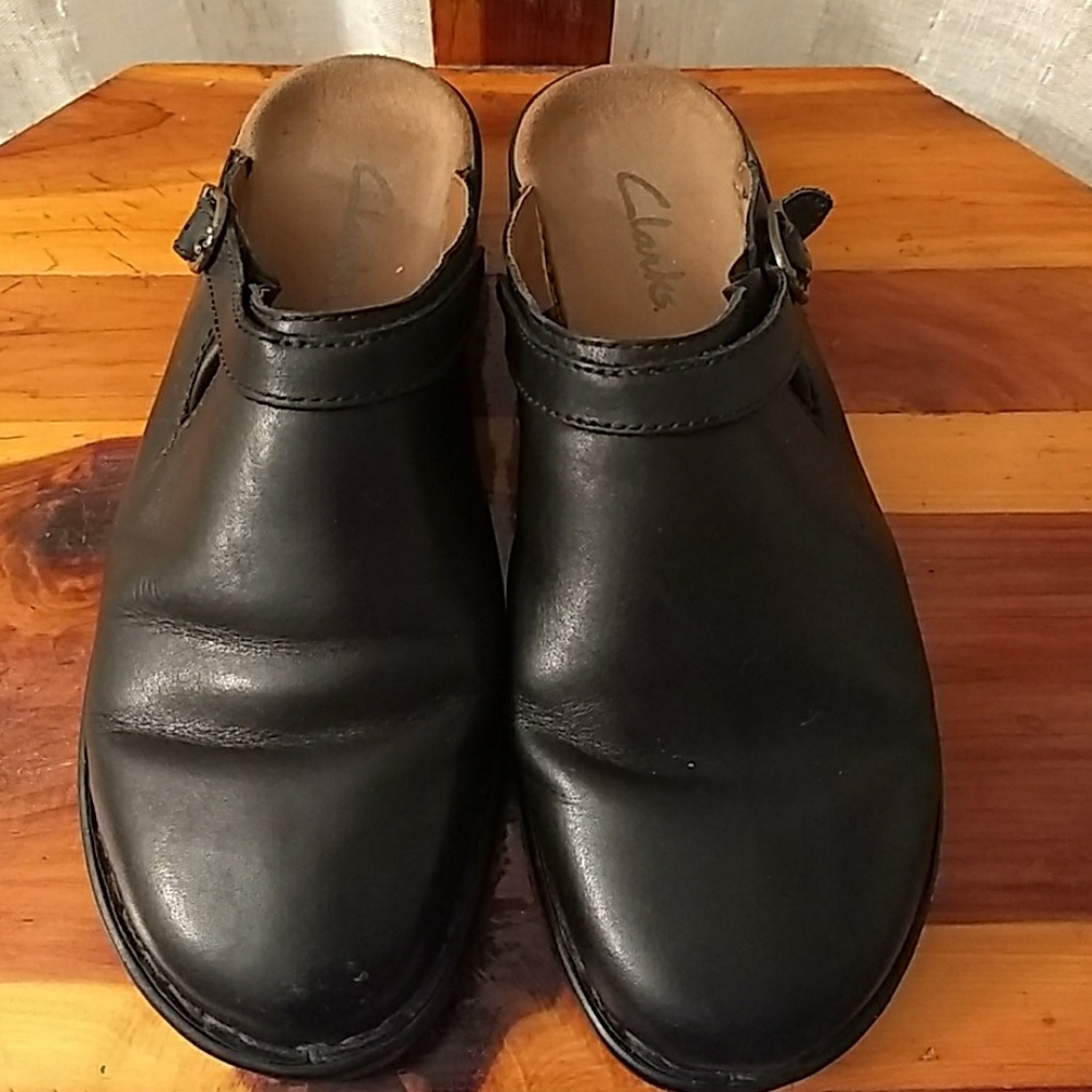 Clarks black leather slip-ons